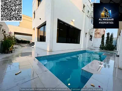 Luxury villa for sale in Al Rawda, freehold ownership for all nationalities, with a modern design and high-end finishes, including a private pool. The