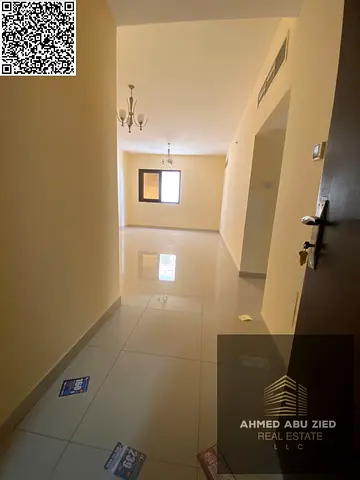 Two bedrooms and a living room for annual rent in Ajman, Al Nuaimiya 1, opposite Al Hikma School, next to Gulf Bridge and Khalifa Street, with a balco