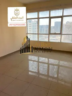 Two bedrooms, a living room, and a balcony in Al Taawun. Payment options: four or six installments.
