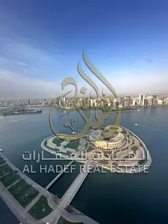 🏠 4-Bedroom Apartment with Maid Room for Annual Rent in Al Majaz 3 – Front View, Three Balconie