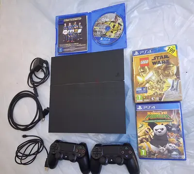 SONY PLAYSTATION 4 CONSOLE 1 TB BUNDLE (GAMES ,CONTROLLER AND CABLE)-MODEL:CUH 1216B JET BLACK. PAL
