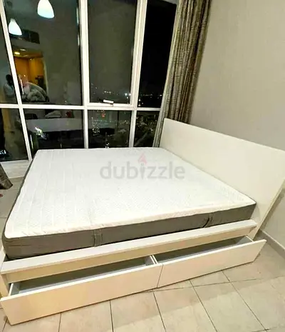 IKEA malam king‑size bed (180 × 200 cm) with 2 storage drawers underneath and an IKEA mattress