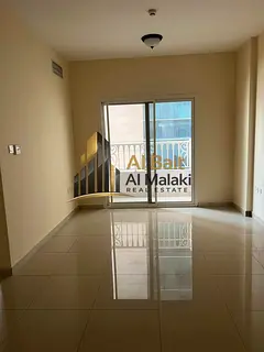 One bedroom and living room with balcony in Al Taawun, spacious area and free parking, directly on t