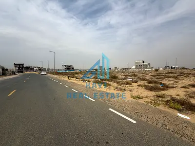 أرض مميزة على زاوية شارع للبيع في مدينة تلال بالشارقة | إمكانات عالية