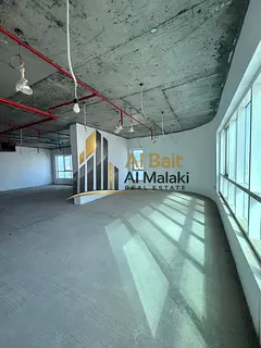 Office for sale in Al Majaz 2, spacious, with air conditioning (owner's included) and three park