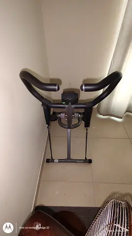 Sunny Health  Fitness Row-N-Ride Squat Assist Trainer for Glutes  Legs Workout with Adjustable Res
