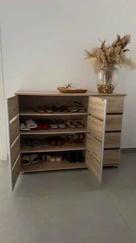 Stylish Shoe Cabinet with Vase of pampass grass