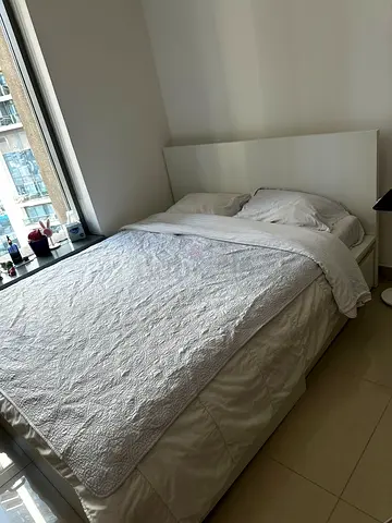 Ikea double bed with mattress available in perfect condition