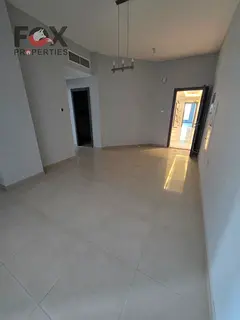 For annual rent, a distinctive apartment in Al Rashidiya 2, in a strategic location next to Falcon T
