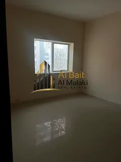 Two bedrooms and a living room in Al Nahda On the Dubai exit , open views
