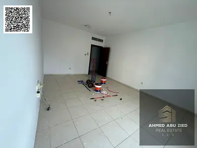 For annual rent in Ajman, Al Nuaimiya 1 – a two-bedroom apartment with a living room, balcony, and two bathrooms, offering comfortable spaces and a pr