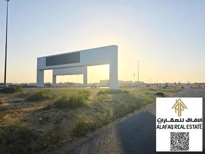 أرض استثمارية للبيع في العامرة عجمان بمساحة 15,000 قدم مربع وتصريح G+35 مع إمكانية بيع شقق مباشرة