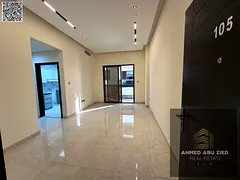 First tenant, 2BR hall apartment in Al Jurf 3, Ajman. Free month, 2 master rooms, 3 baths, central A