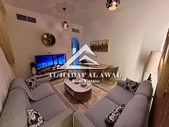 1BR hall in Al Majaz 3, front of Al Safya Park. Clean apartment, good location, close to services. R