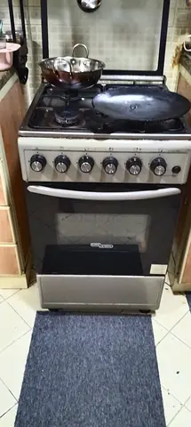 Cooking range and whirlpool fridge working in good condition.