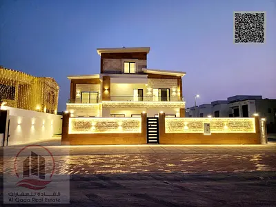 Villa for sale in Ajman Al Yasmeen, 6 master bedrooms, a majlis, 2 living rooms, and a maid's room. Freehold for all nationalities. Bank financing is