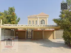 Villa for sale in Ajman, Al Rawda. 5 bedrooms, majlis, 2 living rooms, and maid's room. Freehold