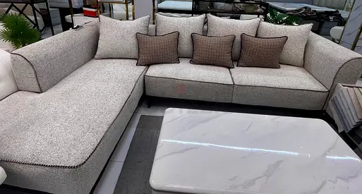 Elegant L-Shaped Sofa with Cushions