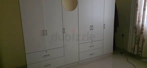 Spacious White Wardrobe with Drawers