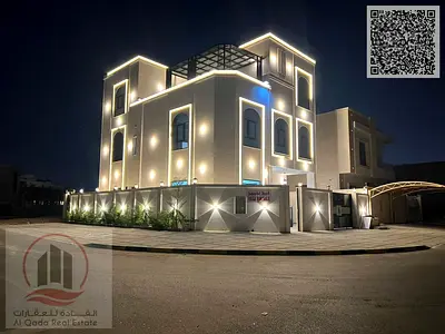 Corner villa for sale in Ajman, Al Amrah area. 7 master bedrooms, majlis, living room, and maid's room. Freehold ownership for all nationalities. Bank