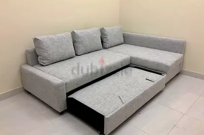 L-Shaped Gray Sofa with Storage