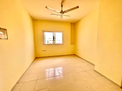 20,999 AED / year – Studio with separate kitchen, about 400 sq ft, family building near the school.