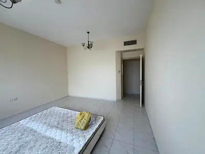 One bedroom and living room in Al Taawun, spacious, central AC, free maintenance during rental, prime location near Dubai exit, flexible payments.