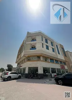 Residential and commercial building for sale in Al Rawda area, Ajman