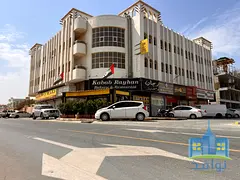 A residential building on a corner with two streets in Rawdah 2.