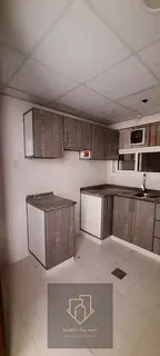 One-bedroom apartment with a living room, bathroom, and balcony, near Al Safir Mall. Spacious and cl