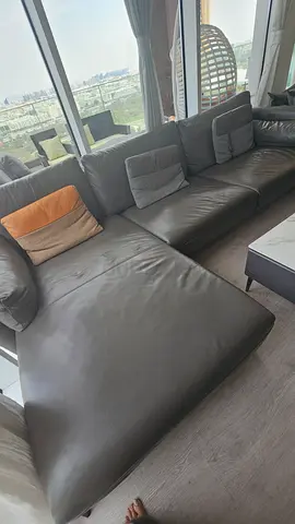 Comfortable Leather Sofa with Marble TOP coffee table in Great Condition