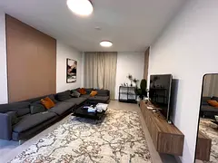 Premium 2BHK Apartment for RENT | Aljada – Areej Fully Equipped Kitchen Balcony with Stunning City