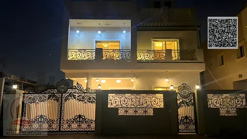 For sale villa in Ajman Al Helio 5 master rooms, a council, a hall and a maid's room, free ownership for all nationalities and the possibility of bank