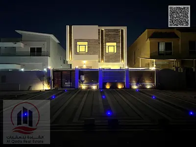 Villa for sale in Ajman, Al Muwaihat area. 6 master bedrooms, majlis, 2 living rooms, and a maid's room. Freehold ownership for all nationalities. Ban