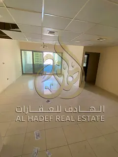Two-bedroom apartment with a living room for rent in Al Majaz 2, with a spacious area, large balcony
