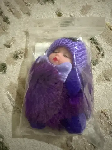 Keychain or medal in the shape of a baby for sale