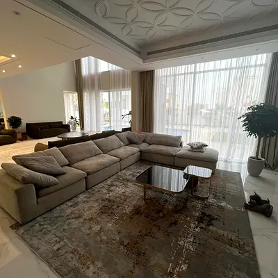Pan Emirates pianca feather filled sofa with footstool