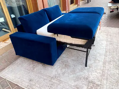 Blue two seater sofa bed with mattress