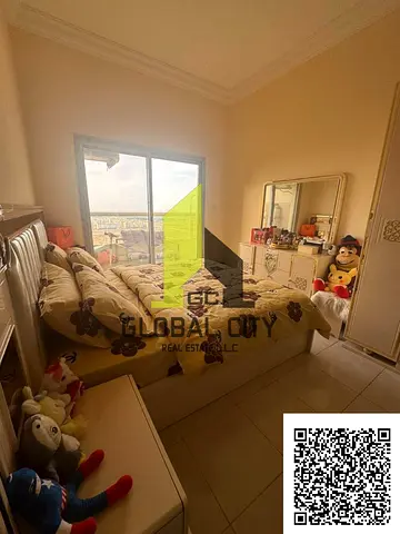 شقة غرفة وصالة مفروشة | 914 قدم مربع | شرفتان | إطلالة على شارع الشيخ زايد | جولدكريست دريم تاور B – عجمان