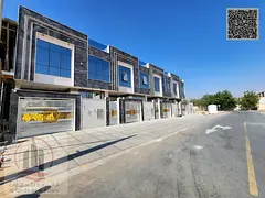 Townhouse villa for sale in Ajman, Al Helio area. 5 master bedrooms, majlis, 2 living rooms, and a m
