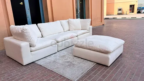 Modular feather filled sofa with footstool marina home brand