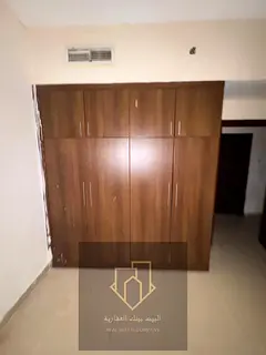 Two-bedroom apartment with a living room in Jasmine Towers, featuring a large spacious layout and a