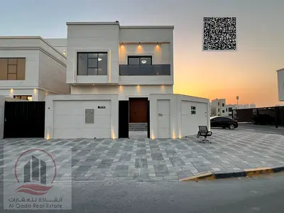 For sale: Corner villa in Ajman Al Helio, 5 master bedrooms, a living room, a maid's room, freehold for all nationalities. Bank financing is possible