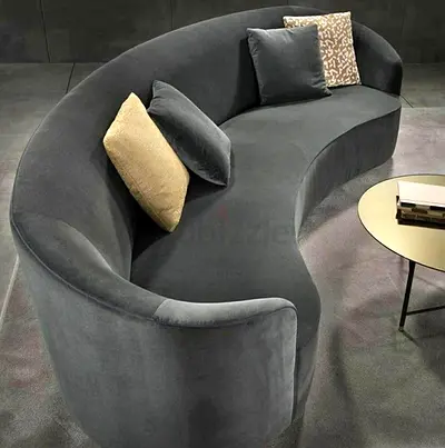 Stylish Curved Sofa with Cushions