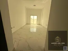 1BR hall for rent in Ajman, master room, 2 baths, balcony, central AC, modern finishing, bright with