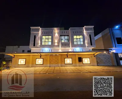 Villa for sale in Ajman, Al Yasmeen area, 5 master bedrooms, a living room, a maid's room, freehold for all nationalities, with bank financing availab