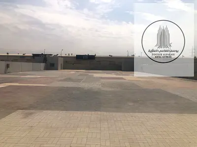 فرصة مميزة للإيجار في موقع استراتيجي – حوطة أرضية إنترلوك بمساحة 20,000 قدم في Sajaa Industrial Area – Sharjah مع مكتب وحمام مناسبة لمختلف الأنشطة الت