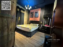 One-bedroom apartment with a living room, balcony, and two bathrooms, furnished with modern furnitur