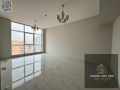 First-tenant 2BR apartment in Al Jurf, annual rent, private parking, central AC, balcony, elegant finish, easy access to Dubai & Sharjah.