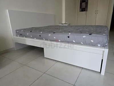 Bed and nightstand
